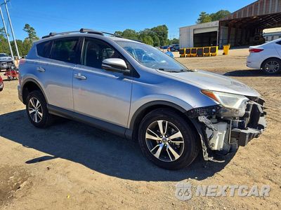 Czwarte zdjęcie samochodu z boku: 2018 TOYOTA RAV4 XLE VIN:JTMWFREV6JD133566 - miniatura
