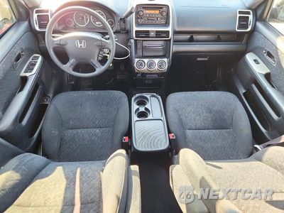 Zdjęcie 8 z 13 samochodu: 2006 HONDA CR-V LX VIN:JHLRD785X6C060446 - miniatura