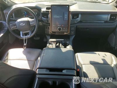 Zdjęcie 8 z 12 samochodu: 2022 FORD F150 LIGHTNING PRO VIN:1FT6W1EV1NWG13235 - miniatura
