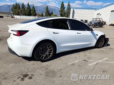 Trzecie zdjęcie samochodu z tyłu: 2024 TESLA MODEL 3 VIN:5YJ3E1EB6RF814201 - miniatura
