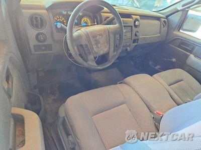 Zdjęcie 8 z 12 samochodu: 2014 FORD F150 VIN:1FTMF1CM1EFD11574 - miniatura