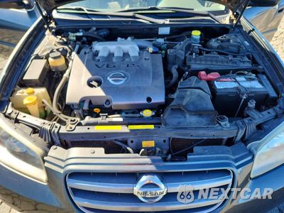 Zdjęcie 11 z 13 samochodu: 2003 NISSAN MAXIMA GXE VIN:JN1DA31D43T525019 - miniatura