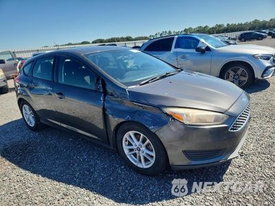 Czwarte zdjęcie samochodu z boku: 2017 FORD FOCUS 4D SE SE VIN:1FADP3K29HL340034 - miniatura