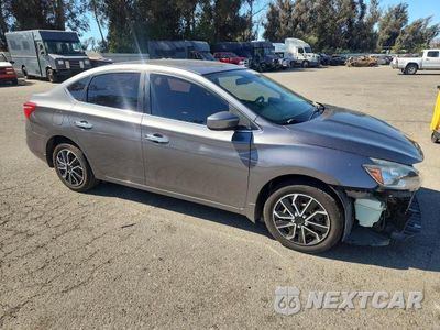 Czwarte zdjęcie samochodu z boku: 2017 NISSAN SENTRA S VIN:3N1AB7AP4HY225402 - miniatura