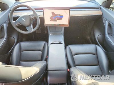Zdjęcie 8 z 13 samochodu: 2022 TESLA MODEL Y VIN:7SAYGAEE7NF429320 - miniatura