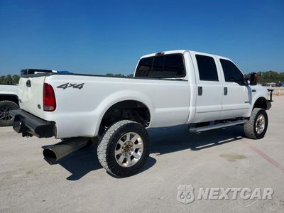 Trzecie zdjęcie samochodu z tyłu: 2004 FORD F350 SRW SUPER DUTY VIN:1FTSW31P74ED34393 - miniatura