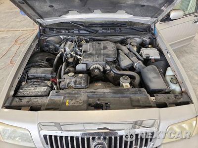 Zdjęcie 11 z 13 samochodu: 2006 MERCURY GRAND MARQUIS LS VIN:2MEFM75V66X609839 - miniatura