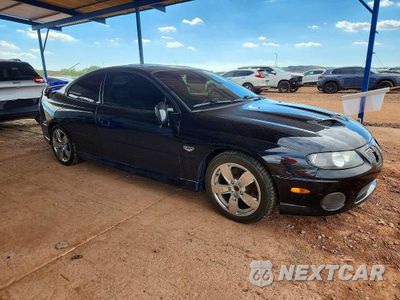 Czwarte zdjęcie samochodu z boku: 2006 PONTIAC GTO VIN:6G2VX12U76L541374 - miniatura