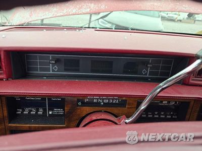 Zdjęcie 9 z 12 samochodu: 1992 CADILLAC DEVILLE VIN:1G6CD13B3N4319562 - miniatura