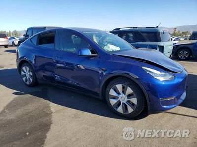 Czwarte zdjęcie samochodu z boku: 2021 TESLA MODEL Y VIN:5YJYGDEE9MF148214 - miniatura