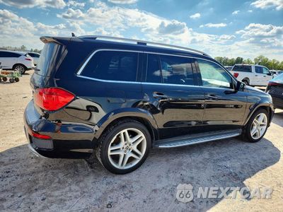 Trzecie zdjęcie samochodu z tyłu: 2014 MERCEDES-BENZ GL 550 4MATIC VIN:4JGDF7DE0EA423849 - miniatura