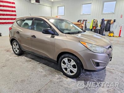 Czwarte zdjęcie samochodu z boku: 2010 HYUNDAI TUCSON GLS VIN:KM8JT3AC8AU040161 - miniatura