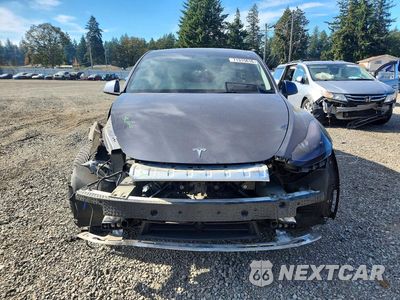 Piąte zdjęcie samochodu w środku: 2021 TESLA MODEL Y VIN:5YJYGAEE8MF274806 - miniatura