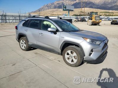 Czwarte zdjęcie samochodu z boku: 2021 TOYOTA RAV4 HYBRID XLE VIN:JTMR6RFV0MD508187 - miniatura