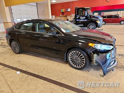 Czwarte zdjęcie samochodu z boku: 2017 FORD FUSION TITANIUM VIN:3FA6P0D94HR211007 - miniatura