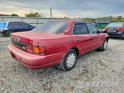 Trzecie zdjęcie samochodu z tyłu: 1994 TOYOTA CAMRY DX VIN:JT2SK11E2R0196824 - miniatura