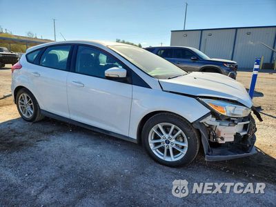 Czwarte zdjęcie samochodu z boku: 2016 FORD FOCUS SE VIN:1FADP3K28GL268676 - miniatura
