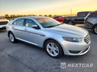 Czwarte zdjęcie samochodu z boku: 2015 FORD TAURUS SEL VIN:1FAHP2E81FG207429 - miniatura