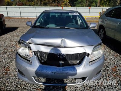 Piąte zdjęcie samochodu w środku: 2010 TOYOTA COROLLA LE VIN:JTDBU4EE8AJ082113 - miniatura