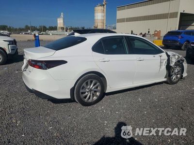 Trzecie zdjęcie samochodu z tyłu: 2022 TOYOTA CAMRY LE VIN:4T1R11AK9NU662407 - miniatura