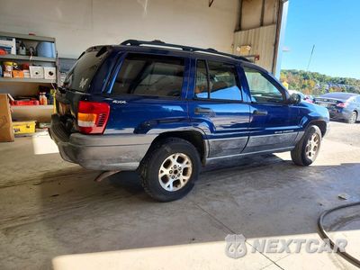 Trzecie zdjęcie samochodu z tyłu: 2000 JEEP GRAND CHEROKEE LAREDO VIN:1J4GW48S9YC239562 - miniatura