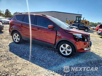 Czwarte zdjęcie samochodu z boku: 2016 FORD ESCAPE SE VIN:1FMCU0GX9GUB73065 - miniatura
