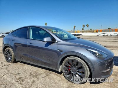 Czwarte zdjęcie samochodu z boku: 2022 TESLA MODEL Y VIN:7SAYGDEF0NF553942 - miniatura