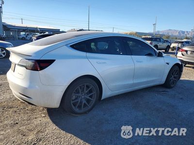 Trzecie zdjęcie samochodu z tyłu: 2019 TESLA MODEL 3 VIN:5YJ3E1EB3KF517778 - miniatura