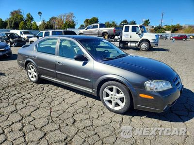 Czwarte zdjęcie samochodu z boku: 2003 NISSAN MAXIMA GXE VIN:JN1DA31D43T525019 - miniatura