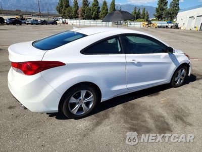 Trzecie zdjęcie samochodu z tyłu: 2013 HYUNDAI ELANTRA COUPE GS VIN:KMHDH6AE6DU016768 - miniatura