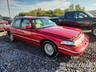 Czwarte zdjęcie samochodu z boku: 1995 FORD CROWN VICTORIA LX VIN:2FALP74W3SX150288 - miniatura