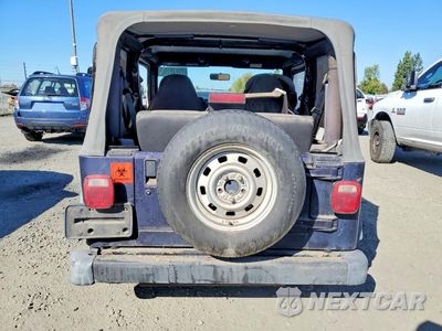 Zdjęcie 6 z 13 samochodu: 1999 JEEP WRANGLER VIN:1J4FY29P7XP447158 - miniatura