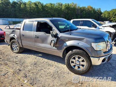 Czwarte zdjęcie samochodu z boku: 2011 FORD F150 SUPERCREW VIN:1FTFW1ET9BFC38012 - miniatura