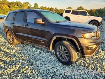 Czwarte zdjęcie samochodu z boku: 2016 JEEP GRAND CHEROKEE LAREDO VIN:1C4RJFAG6GC370767 - miniatura