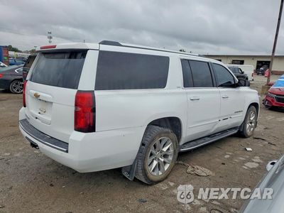Trzecie zdjęcie samochodu z tyłu: 2016 CHEVROLET SUBURBAN K1500 LTZ VIN:1GNSKJKC8GR291411 - miniatura