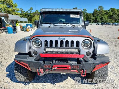 Piąte zdjęcie samochodu w środku: 2015 JEEP WRANGLER UNLIMITED SPORT VIN:1C4BJWDG4FL550678 - miniatura