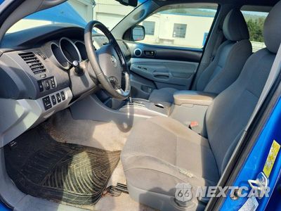 Zdjęcie 7 z 12 samochodu: 2009 TOYOTA TACOMA V6 VIN:3TMLU42N19M028840 - miniatura