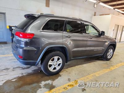 Trzecie zdjęcie samochodu z tyłu: 2014 JEEP GRAND CHEROKEE LAREDO VIN:1C4RJFAG8EC177789 - miniatura