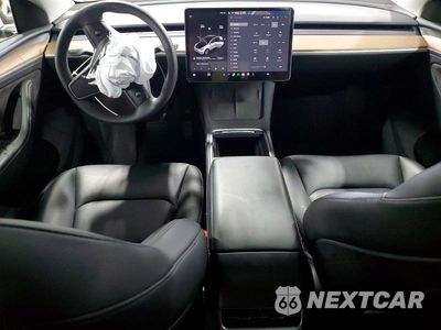 Zdjęcie 8 z 13 samochodu: 2024 TESLA MODEL Y VIN:7SAYGDEE2RA260103 - miniatura