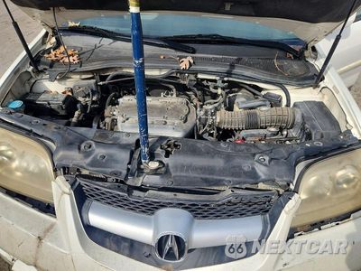 Zdjęcie 12 z 13 samochodu: 2006 ACURA MDX TOURING VIN:2HNYD18806H533066 - miniatura