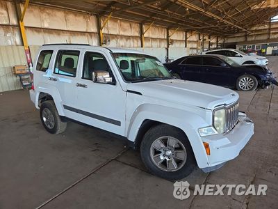 Czwarte zdjęcie samochodu z boku: 2012 JEEP LIBERTY SPORT VIN:1C4PJMAK6CW151140 - miniatura