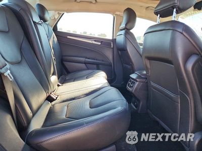 Zdjęcie 10 z 13 samochodu: 2016 FORD FUSION TITANIUM PHEV VIN:3FA6P0SU4GR363195 - miniatura
