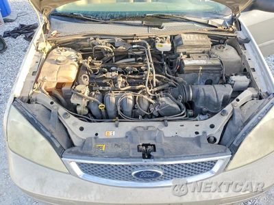 Zdjęcie 11 z 13 samochodu: 2007 FORD FOCUS ZX4 VIN:1FAFP34N57W173331 - miniatura