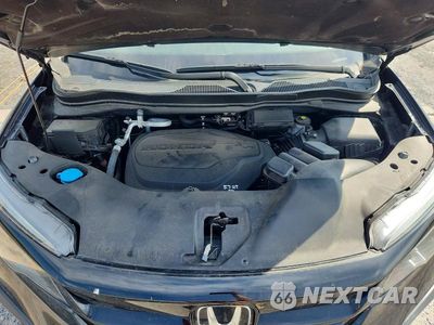 Zdjęcie 12 z 14 samochodu: 2021 HONDA PILOT SE VIN:5FNYF6H24MB082624 - miniatura