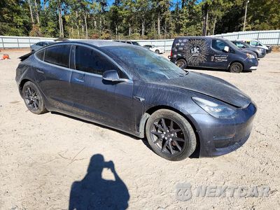 Czwarte zdjęcie samochodu z boku: 2018 TESLA MODEL 3 VIN:5YJ3E1EAXJF077502 - miniatura