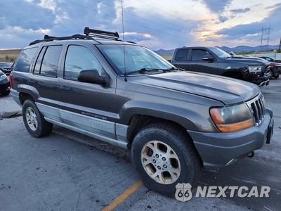 Czwarte zdjęcie samochodu z boku: 2000 JEEP GRAND CHEROKEE LAREDO VIN:1J4GW48NXYC168947 - miniatura