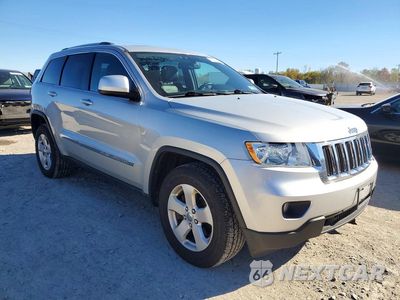 Czwarte zdjęcie samochodu z boku: 2012 JEEP GRAND CHEROKEE LAREDO VIN:1C4RJFAT8CC218481 - miniatura