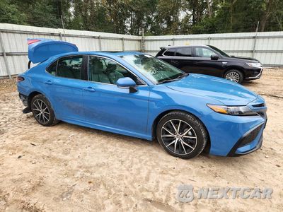 Czwarte zdjęcie samochodu z boku: 2023 TOYOTA CAMRY HYBRID SE VIN:4T1S31AK2PU052878 - miniatura