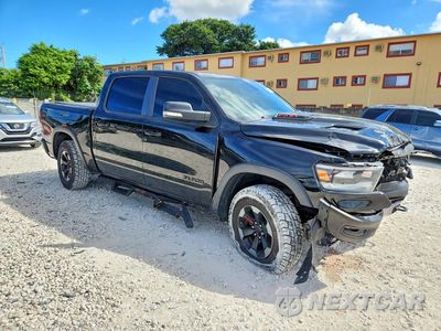Czwarte zdjęcie samochodu z boku: 2019 RAM 1500 REBEL VIN:1C6SRFLTXKN722256 - miniatura
