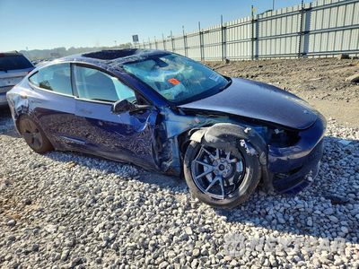 Czwarte zdjęcie samochodu z boku: 2022 TESLA MODEL 3 VIN:5YJ3E1EB7NF194503 - miniatura